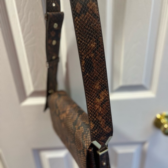 Black and brown animal print small sized crossbody purse. - Picture 9 of 11